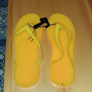 Bright Yellow Flip Flops